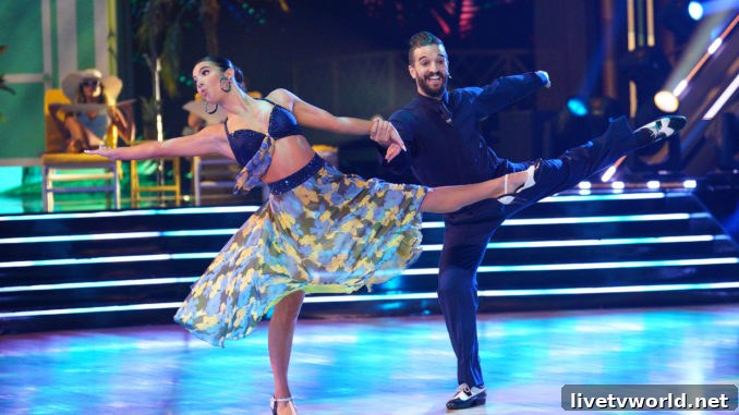 DANCING WITH THE STARS - “Elvis Night” – The 15 remaining couples “Can’t Help Falling in Love” with Elvis this week as they take on all-new dance styles to music by The King of Rock ‘n’ Roll. Week two of the mirorrball competition will stream live MONDAY, SEPT. 26 (8:00pm ET / 5:00pm PT), on Disney+. (ABC/Christopher Willard) CHARLI D’AMELIO, MARK BALLAS