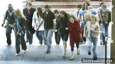 Production crew and contestants on City Hall steps
